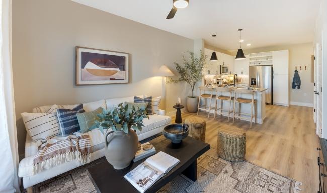 a living room with a couch and a table