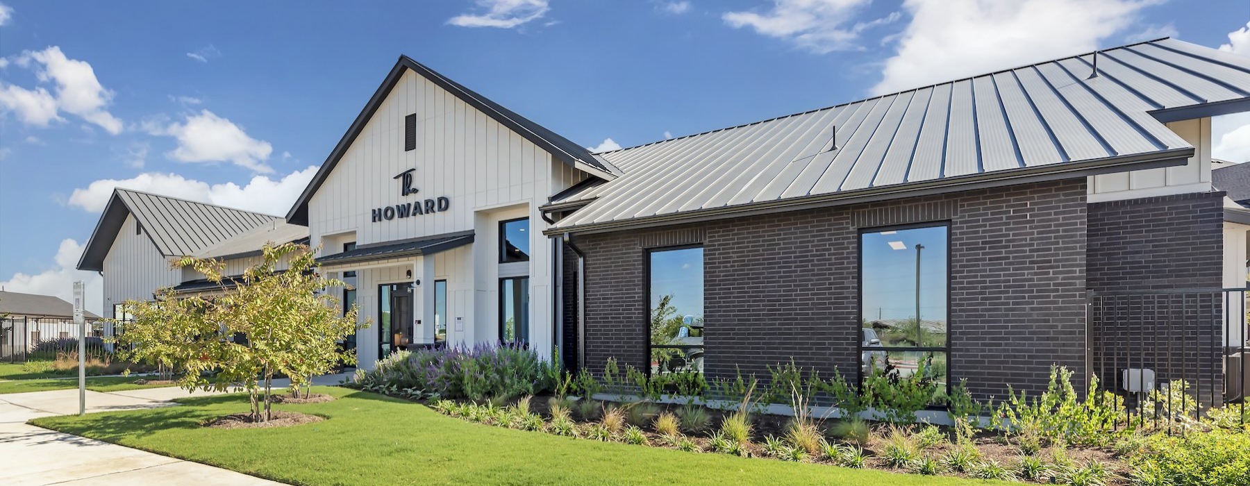 a building with a lawn in front of it
